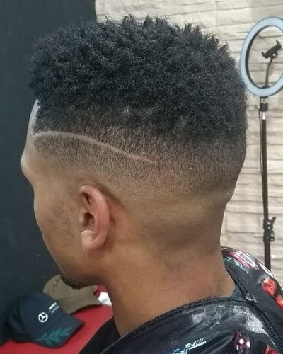 Natural Hair Top with Low Fade and Shaved Line 