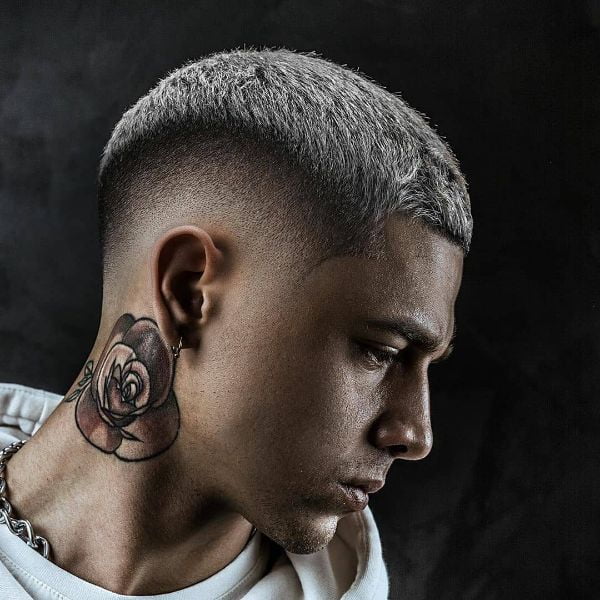 A man with tattoo on his neck
