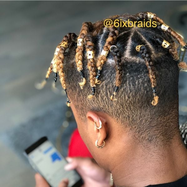 Short Box Braids with Undercut Fade Cuts and Hair Beads