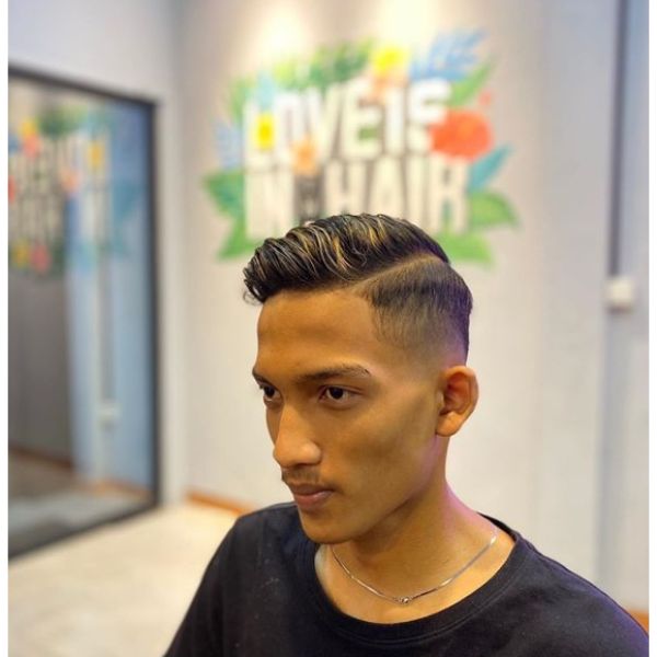 High Fade with Long Sleek Top and Hard Part