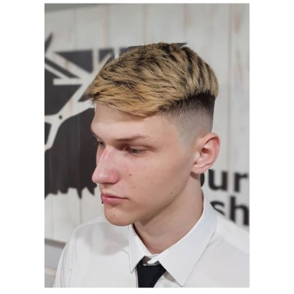  High Fade Disconnected Hairstyle with Blonde Tips
