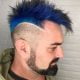 Spiky Mohawk with Dark Blue Strands and Faded Sides