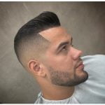 High Fade With Small Pomp Hairstyle
