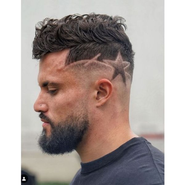 High Fade With Wavy Top And Star-shaped Razor Pattern