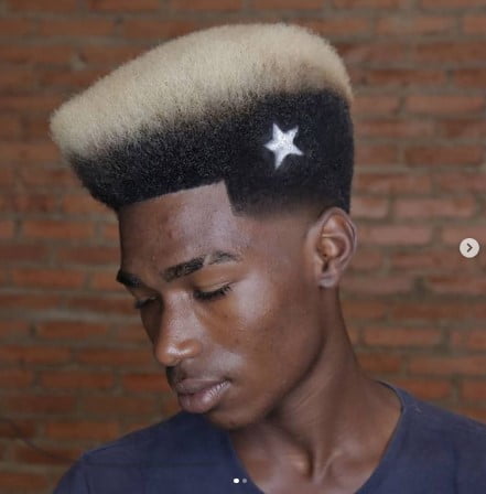 High-Top With Blonde Highlights And Side Star Pattern