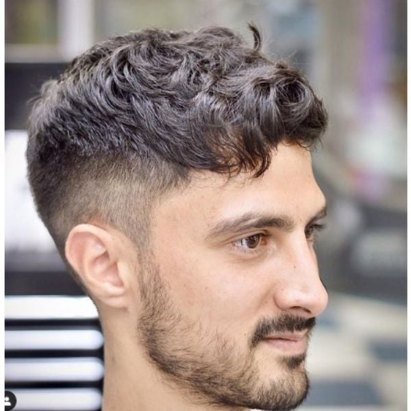 Mid Fade With Wavy Front Quiff Hairstyle For Men