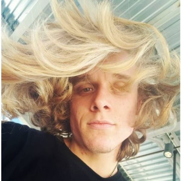  Wavy Blonde Long Skater Haircut For Men