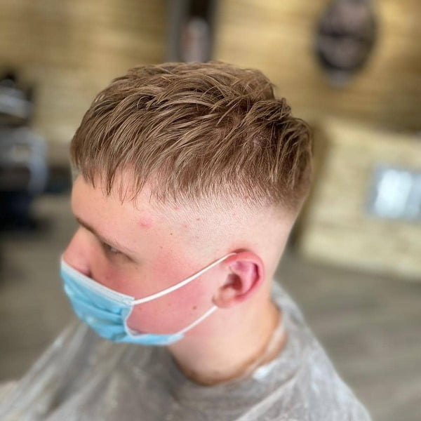Man with his Mid Fade Textured Top