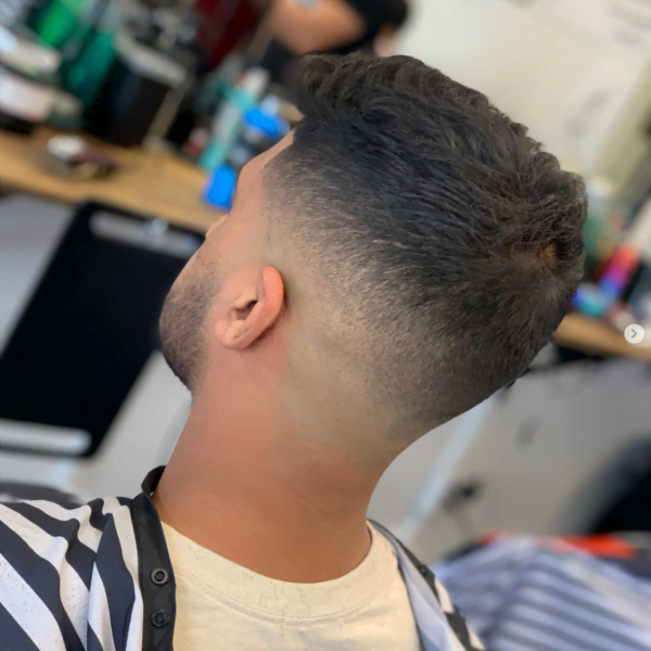 A Man with his Mid Razor Fade