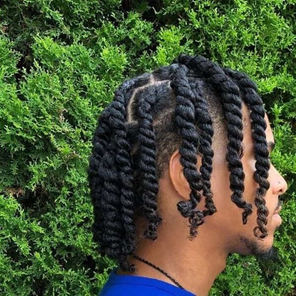 Boy with his Thick Two Strand Braids with Fade
