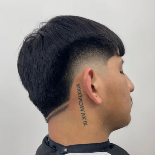 Guy with tattoo on his neck had his hair styled into Burst Fade Haircut