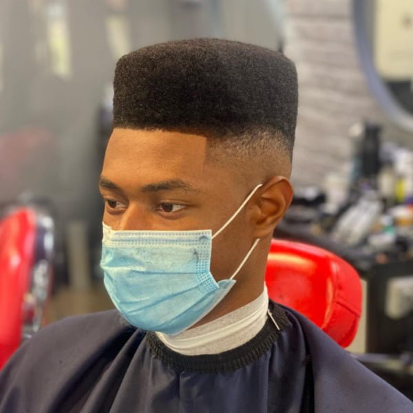 Black guy wearing mask with his High Flat Top Haircut