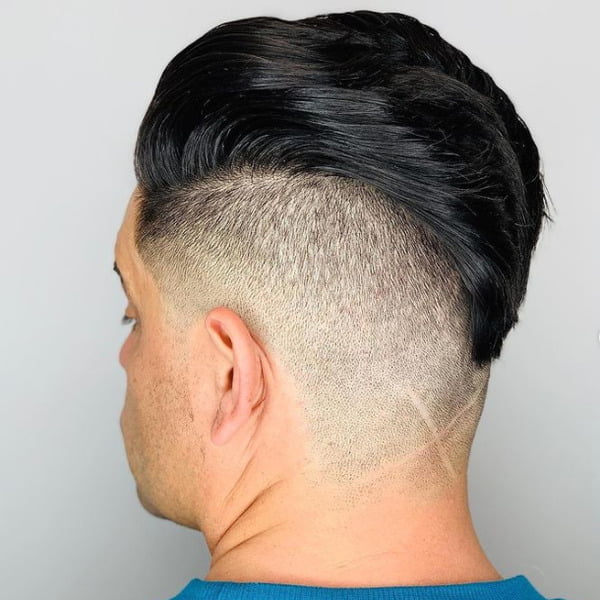 Guy had his hair styled into Pompadour Undercut Harper's Style