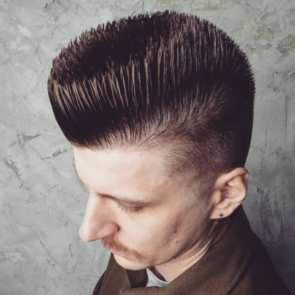 Man with mustache had his hair styled into Tapered Flat Top Haircut